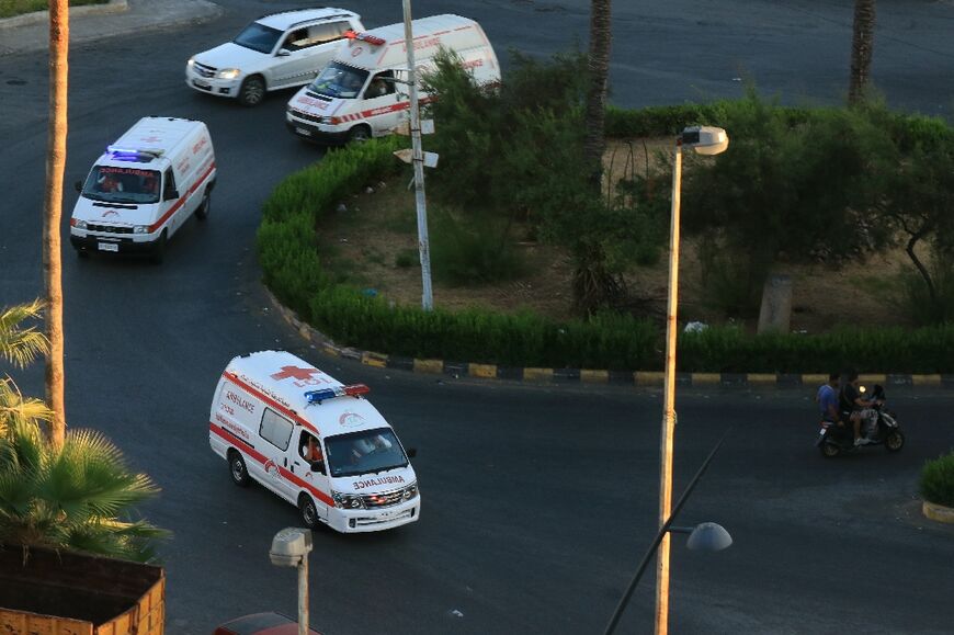 In southern Lebanon, ambulances rush between the cities of Tyre and Sidon in both directions and hospitals are cordoned off