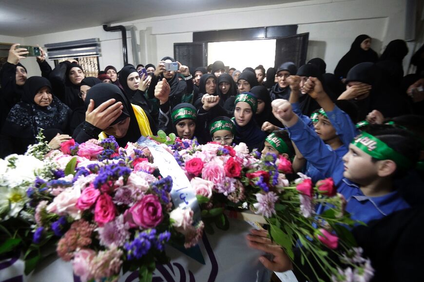 Relatives mourn Fatima Abdallah, a 10-year-old girl killed in the pager explosions