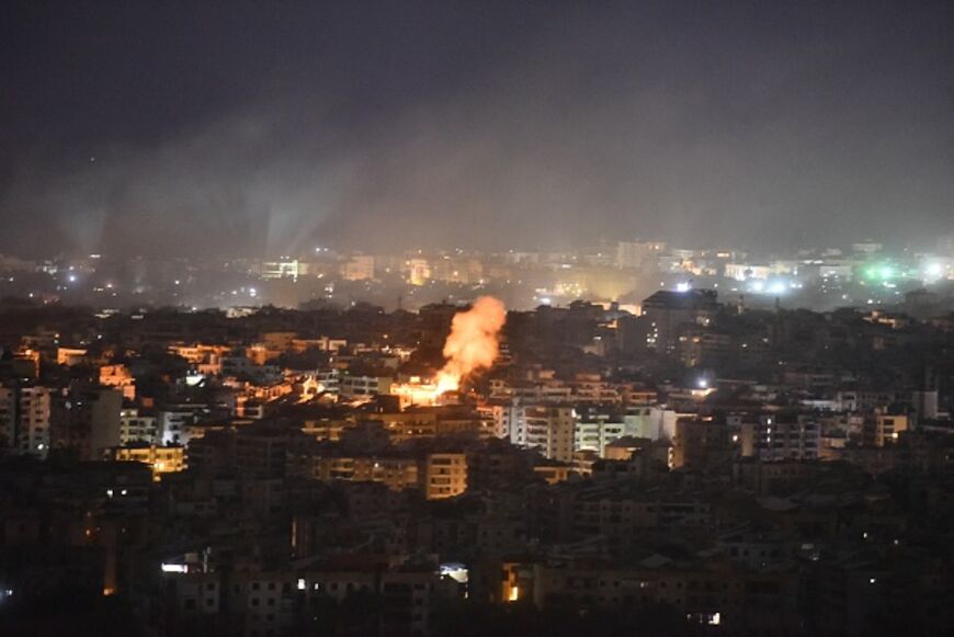 Smoke rises from the site of an Israeli airstrike that targeted a neighborhood in Beirut's southern suburb early on October 1, 2024. A Lebanese security official said Israel had conducted at least six strikes on south Beirut in the night from Monday to Tuesday, after Israel's army called on residents in the Hezbollah stronghold to evacuate. (Photo by Fadel ITANI / AFP) (Photo by FADEL ITANI/AFP via Getty Images)