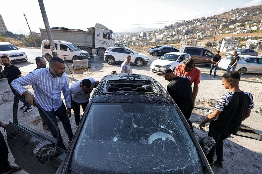 The remains of a car targeted in a deadly Israeli air strike in Tubas, in the north of the occupied West Bank