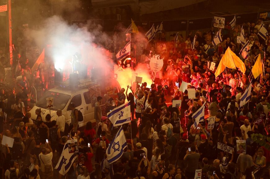 Demonstrators call for action to secure the release of Israeli hostages, in front of the defence ministry in Tel Aviv on September 3, 2024