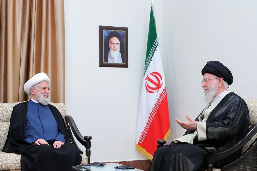 Qassem (L) is seen here meeting Iran's supreme leader, Ayatollah Ali Khamenei, in July