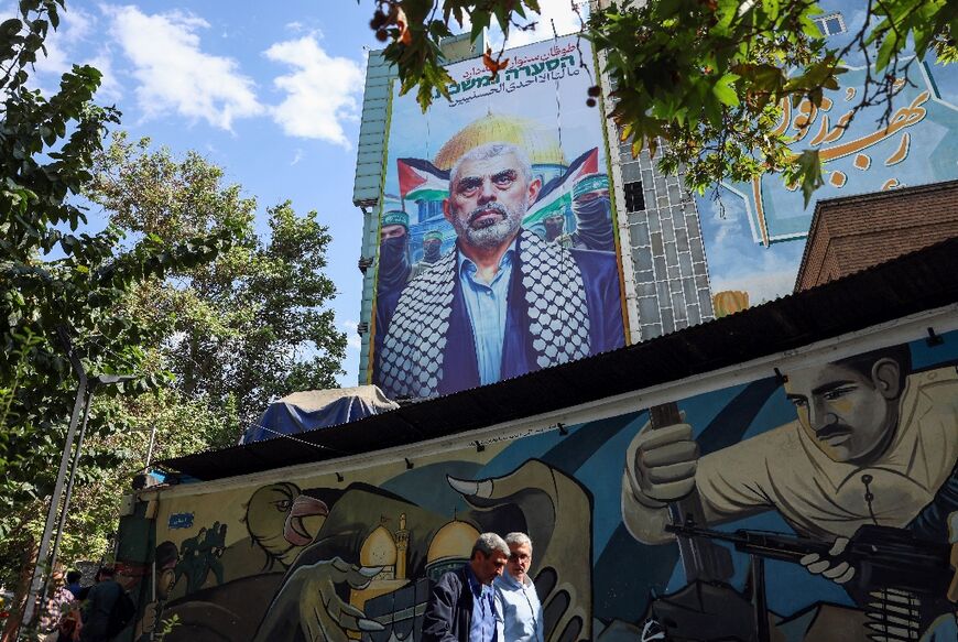 A billboard bearing a portrait of Hamas' slain leader Yahya Sinwar is seen in Tehran