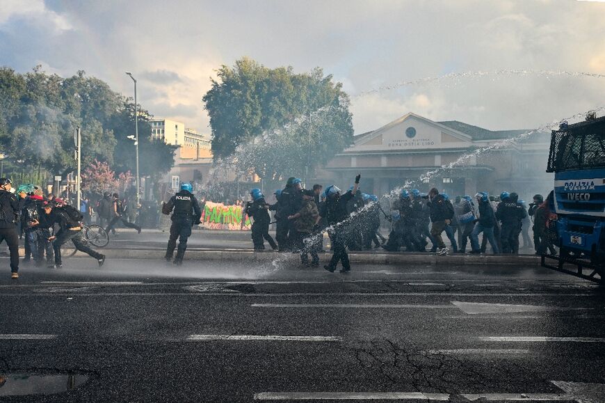 Police officers clash with protestors during a pro-Palestinian demonstration in Rome