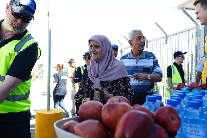 Australian nationals, evacuated from Lebanon, arrive at Larnaca International Airport in nearby Cyprus 