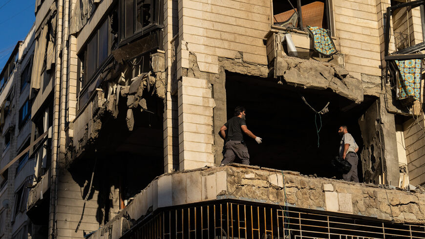 Smoke rises from buildings hit in an overnight Israeli airstrike that targeted the southern suburbs of Beirut, Lebanon, Oct. 3, 2024.