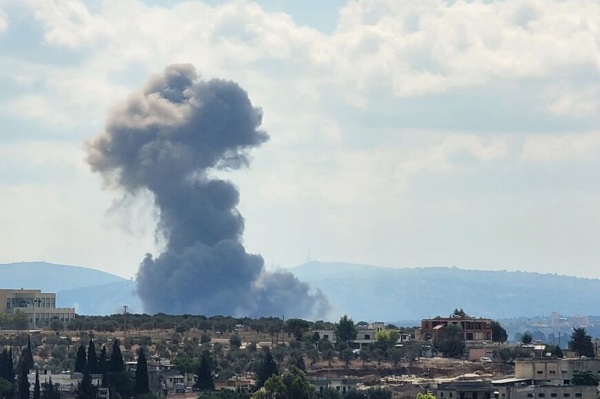 Smoke rises after an Israeli airstrike that targeted the southern Lebanese village of Kfar Tebnit