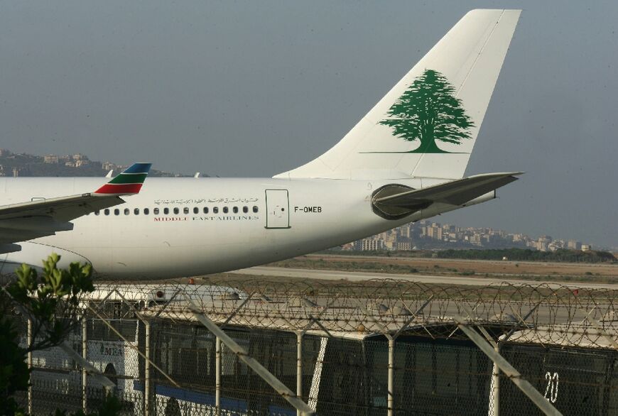 An MEA plane sits on the tarmac after an Israeli air raid shut down Beirut airport in 2006