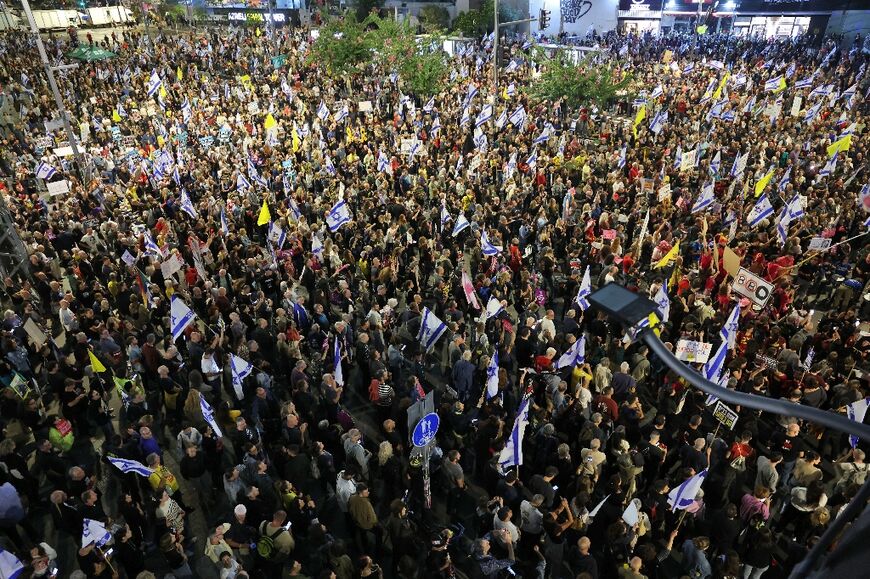 Demonstrators in front of the Israeli Defence Ministry in Tel Aviv call for action to secure the release of Israeli hostages held captive since the October 7, 2023 attack by Palestinian militants 