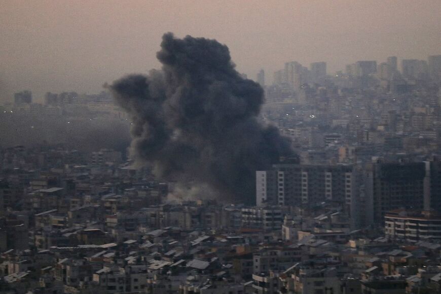 Smoke rises after an Israeli air strike on Beirut's southern suburbs