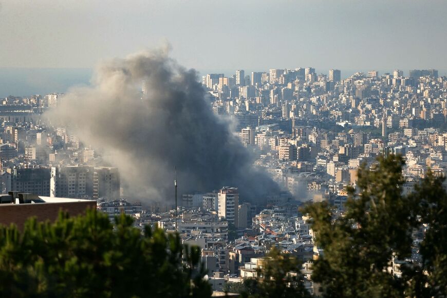 Smoke rises during an Israeli air strike on the Haret Hreik neighbourhood in Beirut's southern suburbs