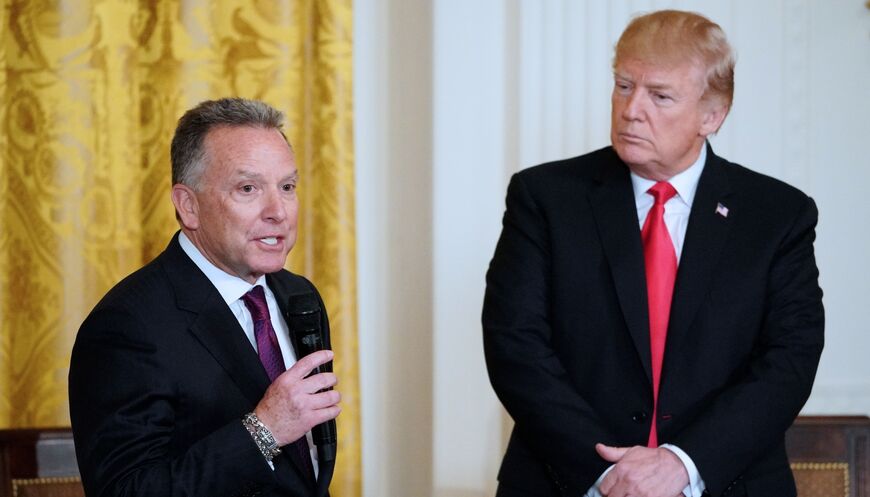 US President Donald Trump watches his friend Steve Witkoff, who's son died of a prescription drug overdose, speak at the White House Opioid Summit in the East Room of the White House on March 1, 2018 in Washington.