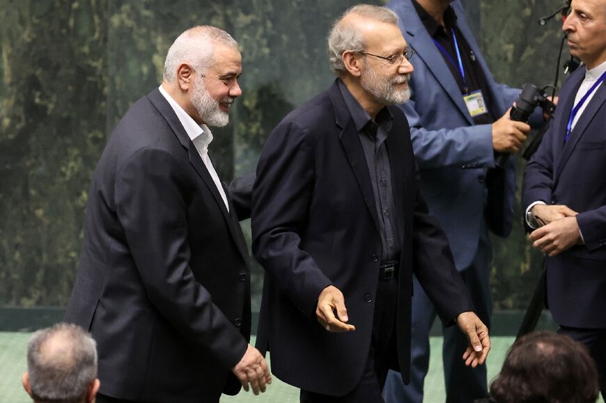 Regime insider Ali Larijani, shown with Ismail Hanieyeh hours before his death, sounded the alarm over infiltration