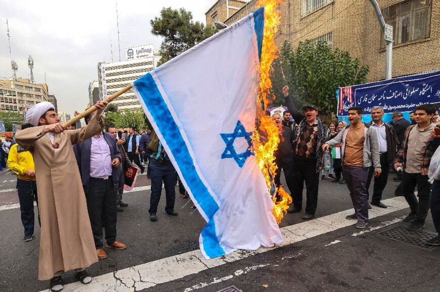 People burned US and Israeli flags at the rally