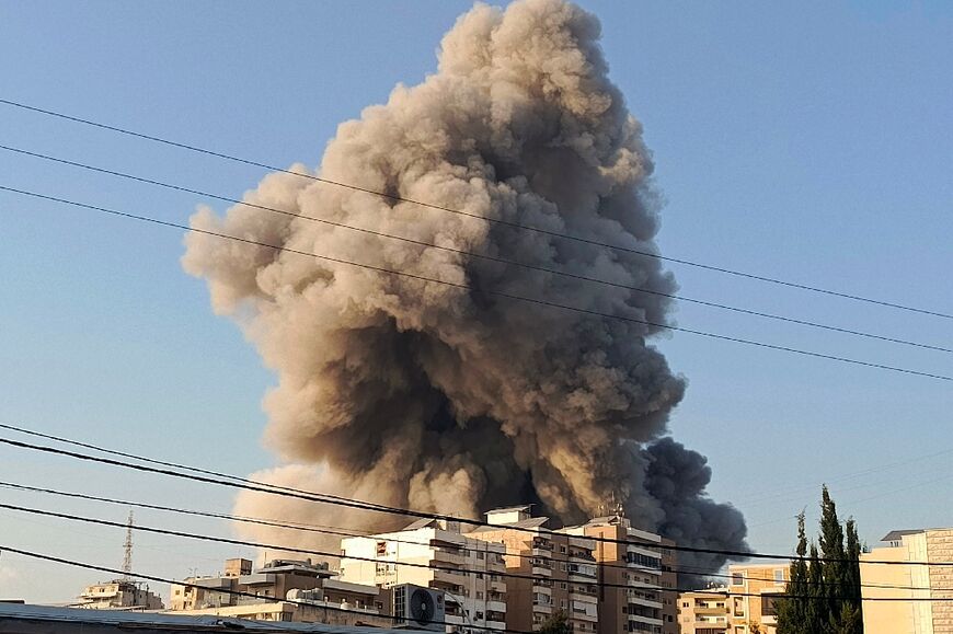 Smoke rises from the site of an Israeli air strike in Lebanon's city of Tyre