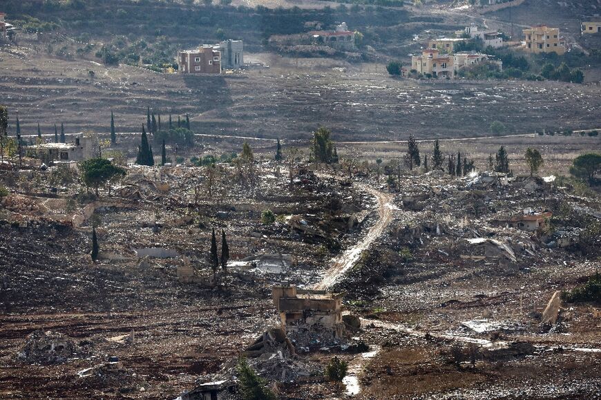 Damaged and destroyed buildings in the southern Lebanese village of Meiss El-Jabal can be seen from just across the border in Israeli territory