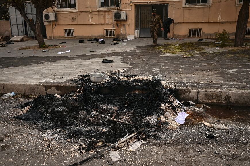 AFP journalists found a bonfire of captagon pills on the grounds of the Mazzeh air base, now in the hands of HTS rebel fighters