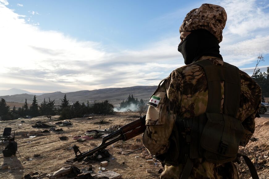 A member of the rebel forces positioned near Sednaya on December 11, 2024. Photo credit: Morhaf Kiwan.