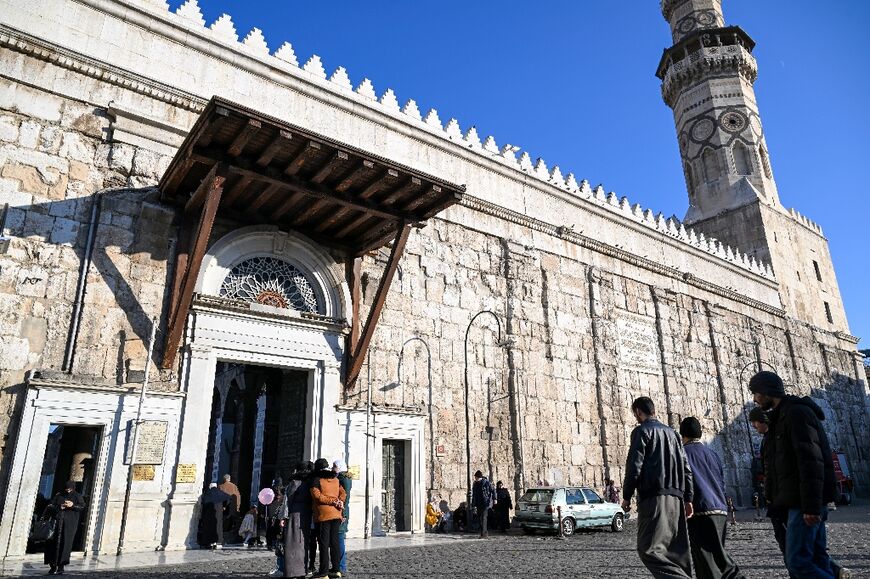 Syrians head to the capital's landmark Umayyad Mosque.