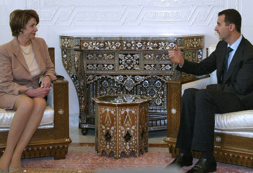 Syria's then president Bashar al-Assad meets then US House speaker Nancy Pelosi at al-Shaab Palace in Damascus in 2007