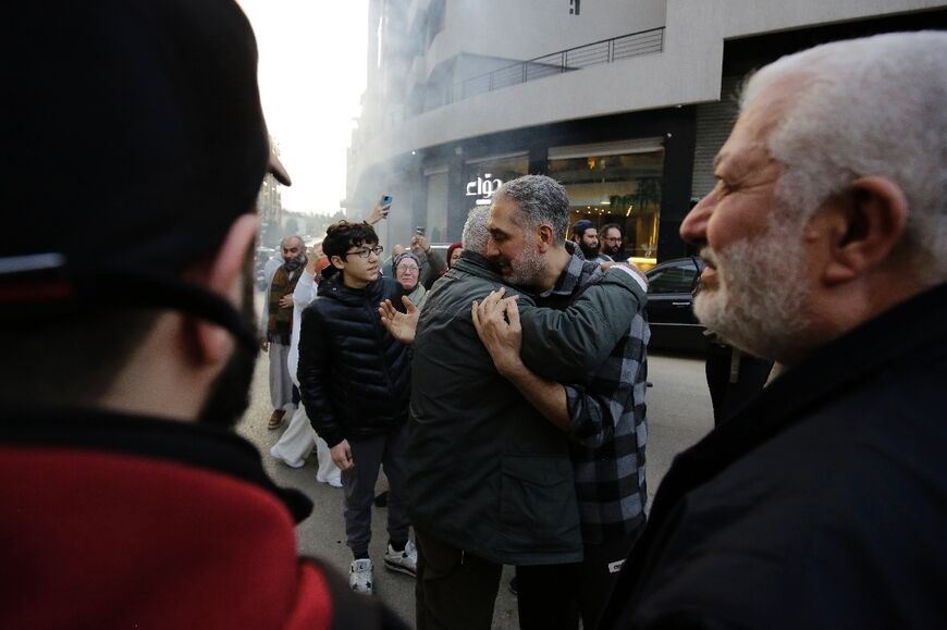 Moaz Merheb, 51, is received by his family and friends after 18 years of imprisonment in Syria's notorious Saydnaya prison