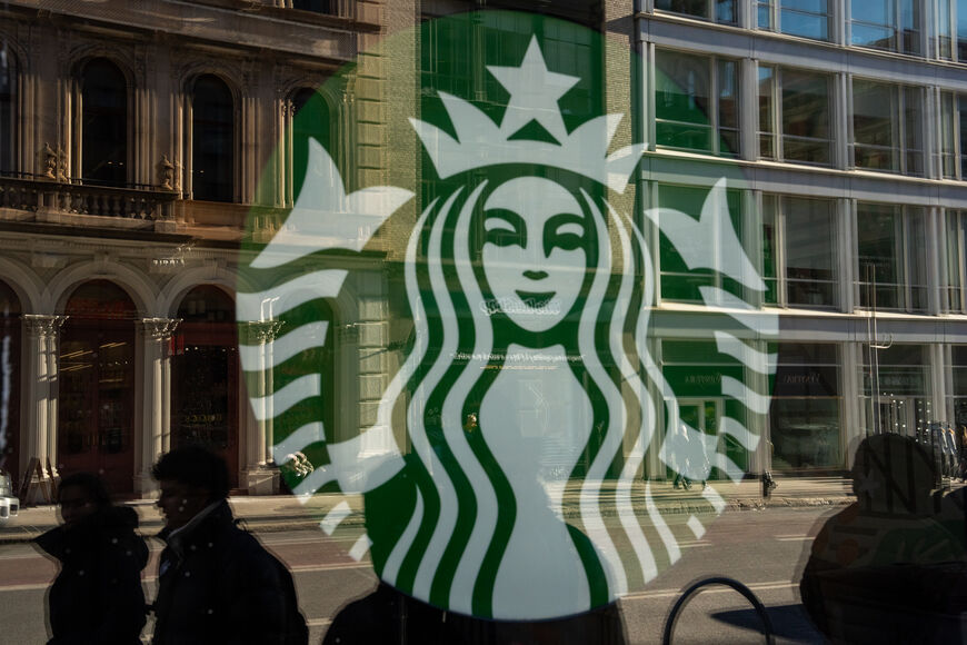 NEW YORK, NEW YORK - DECEMBER 23: Starbucks employees, union members and supporters strike outside of a Starbuck store which is closed down due to the strike on December 23, 2024 in New York City. Starbucks Workers United stated that union workers in Missouri, New Jersey, and New York started their strike on Sunday, following the participation of locations in Colorado, Ohio, and Pennsylvania on Saturday. The union represents over 10,000 employees across more than 525 stores. (Photo by Adam Gray/Getty Images